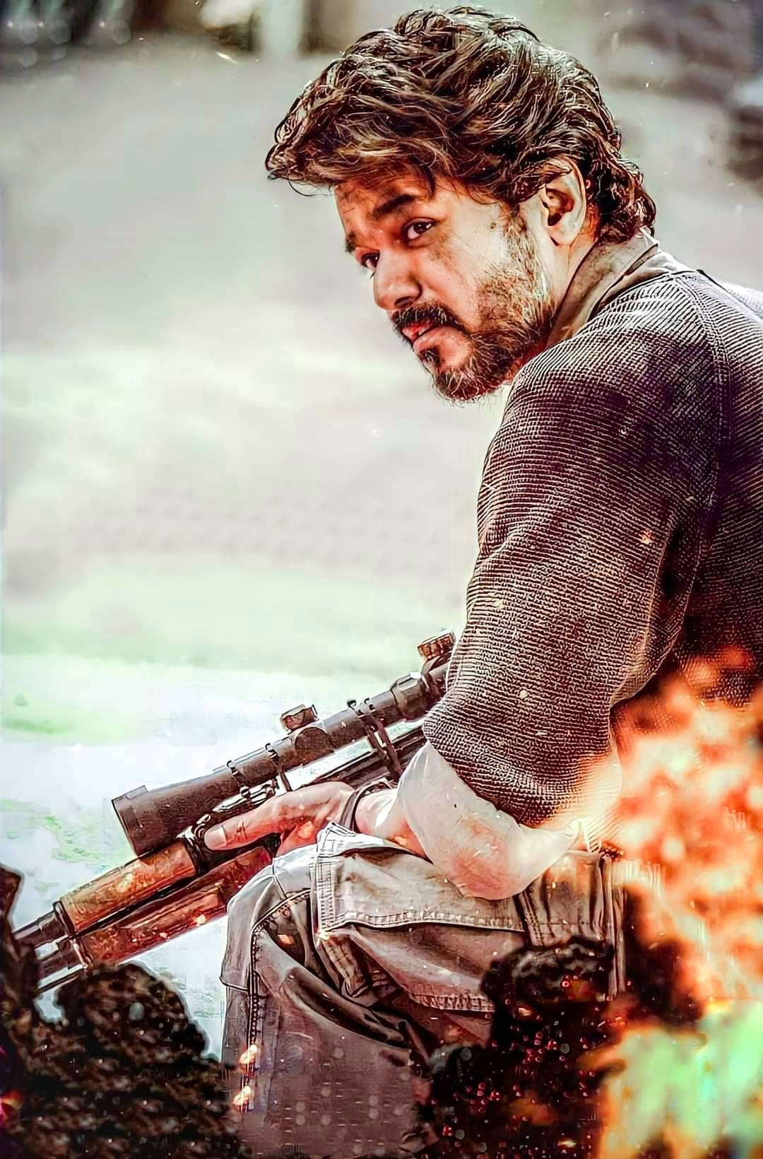 Beast Vijay Kneeling With Gun Background