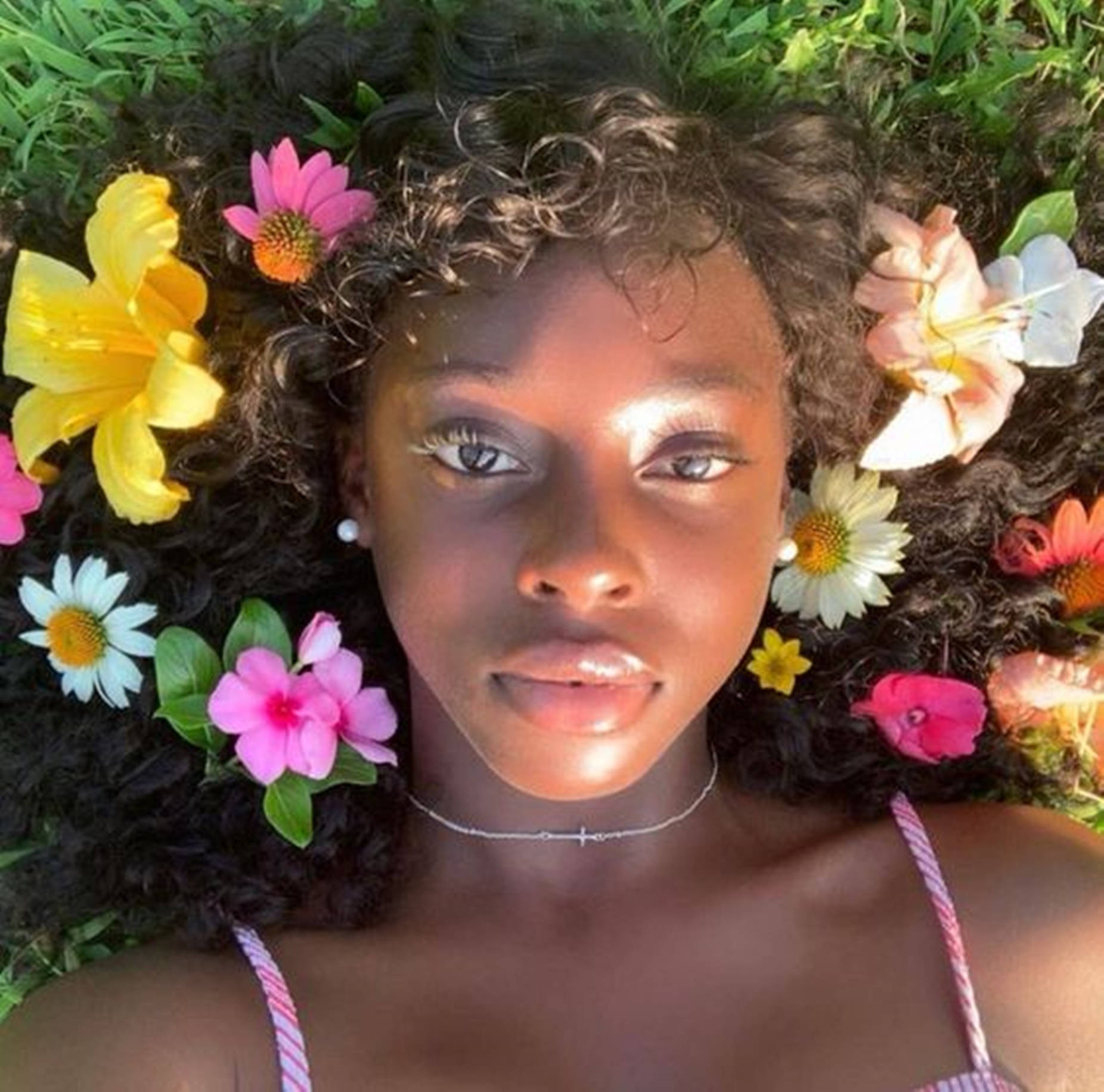 Beautiful Black Woman On Flower Field Background