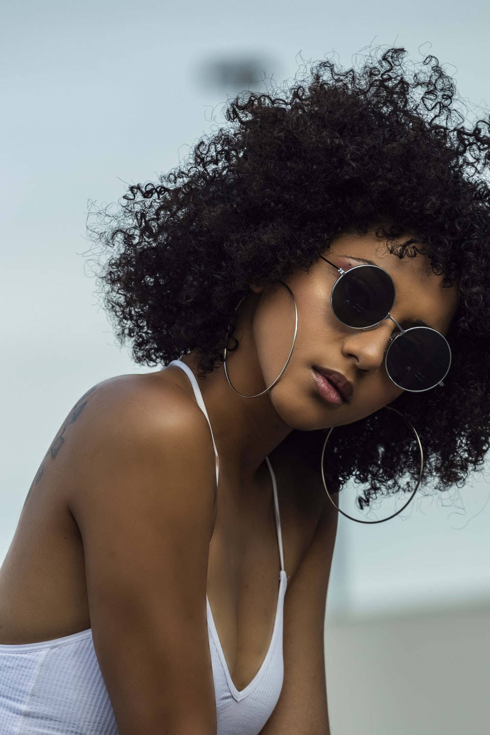 Beautiful Black Woman Wearing Sunglasses Background