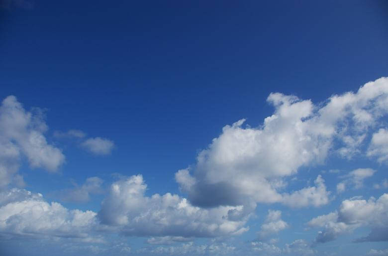 Beautiful Blue Cloud-filled Sky Background