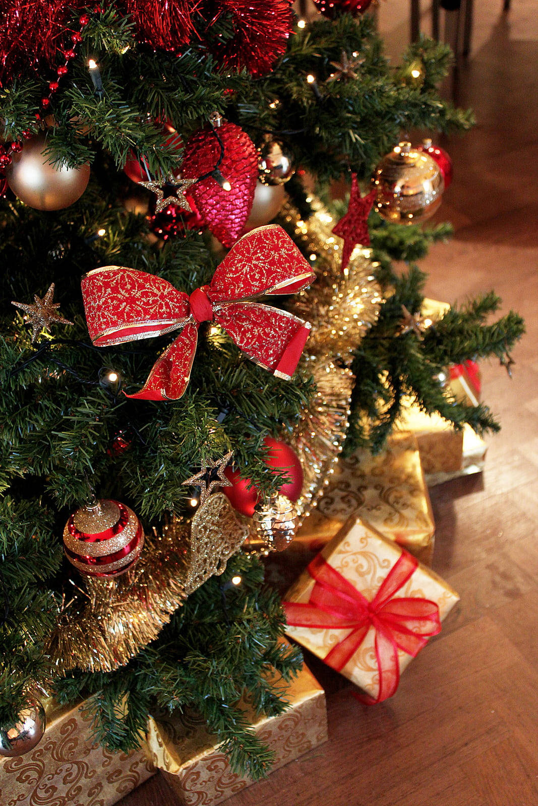 Beautiful Christmas Gifts Under The Tree Background