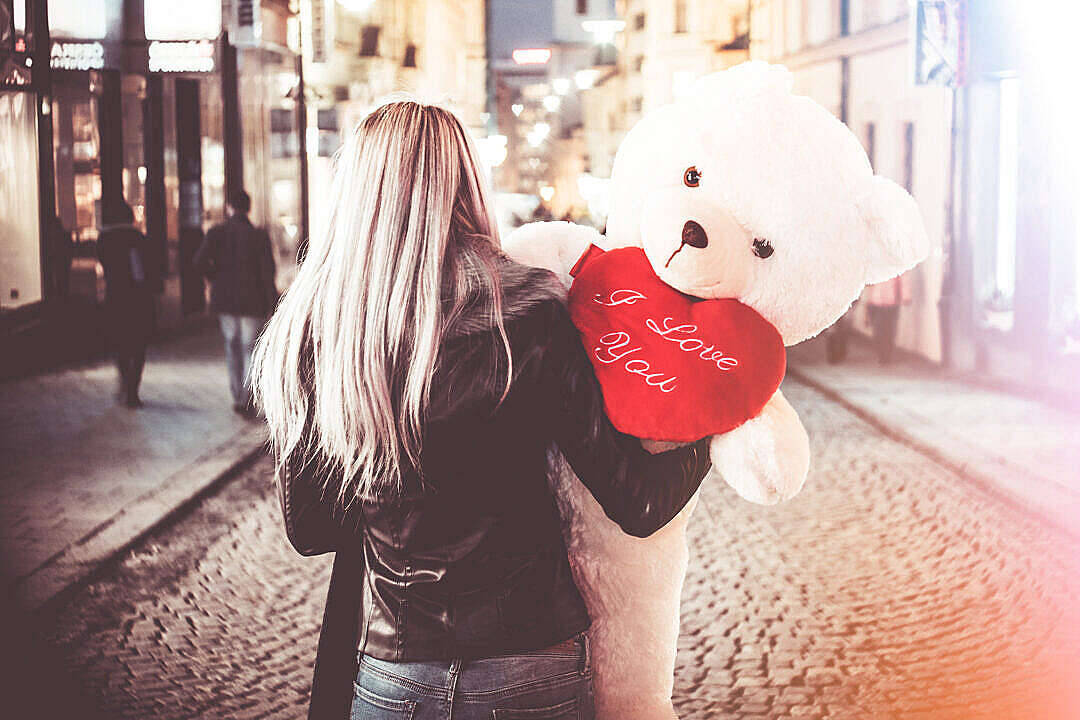 Beautiful Cute Woman With A Teddy Bear Background