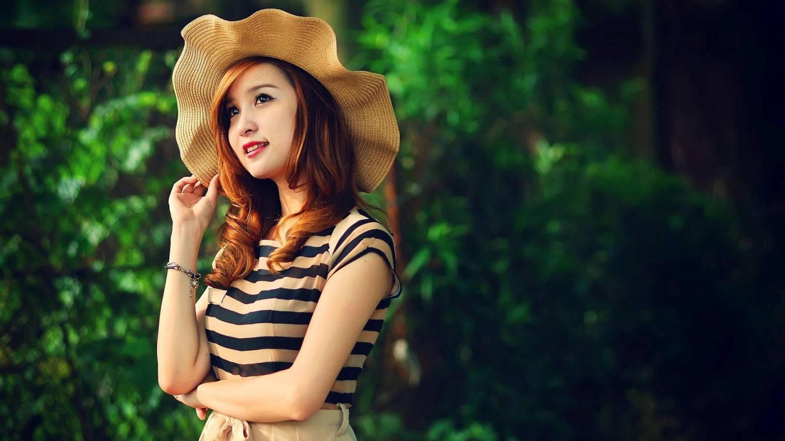 Beautiful Girl In A Sun Hat Background