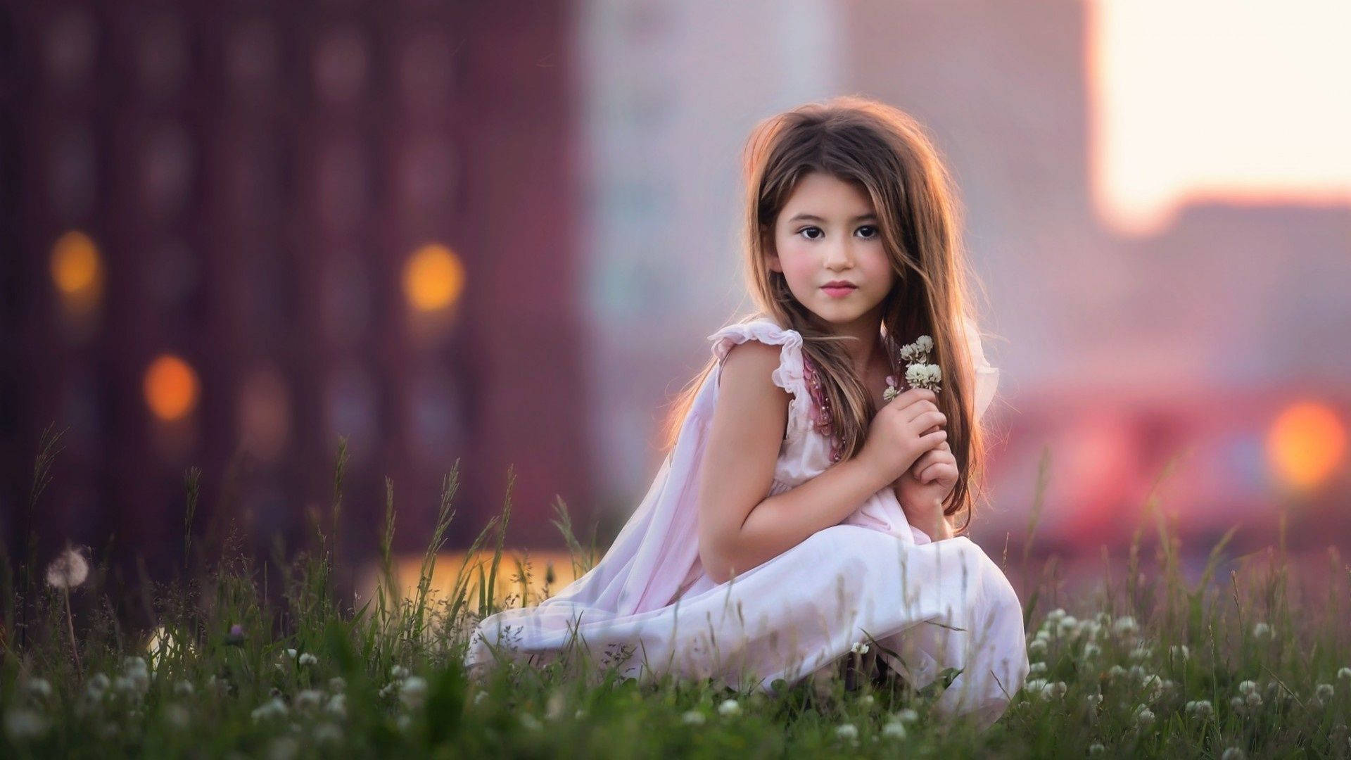 Beautiful Girl On A Flower Field Background