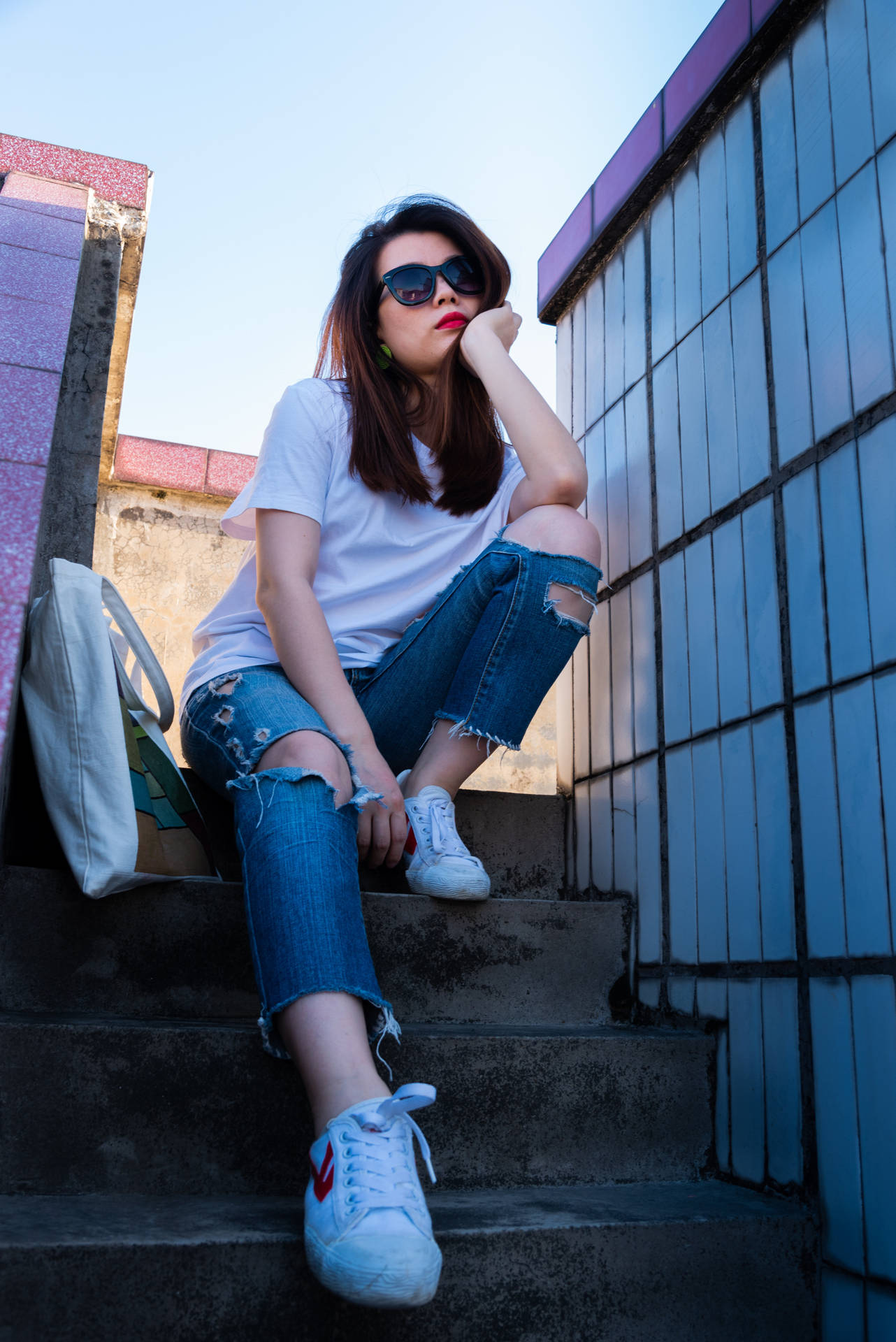 Beautiful Girl Sitting On City Steps Background