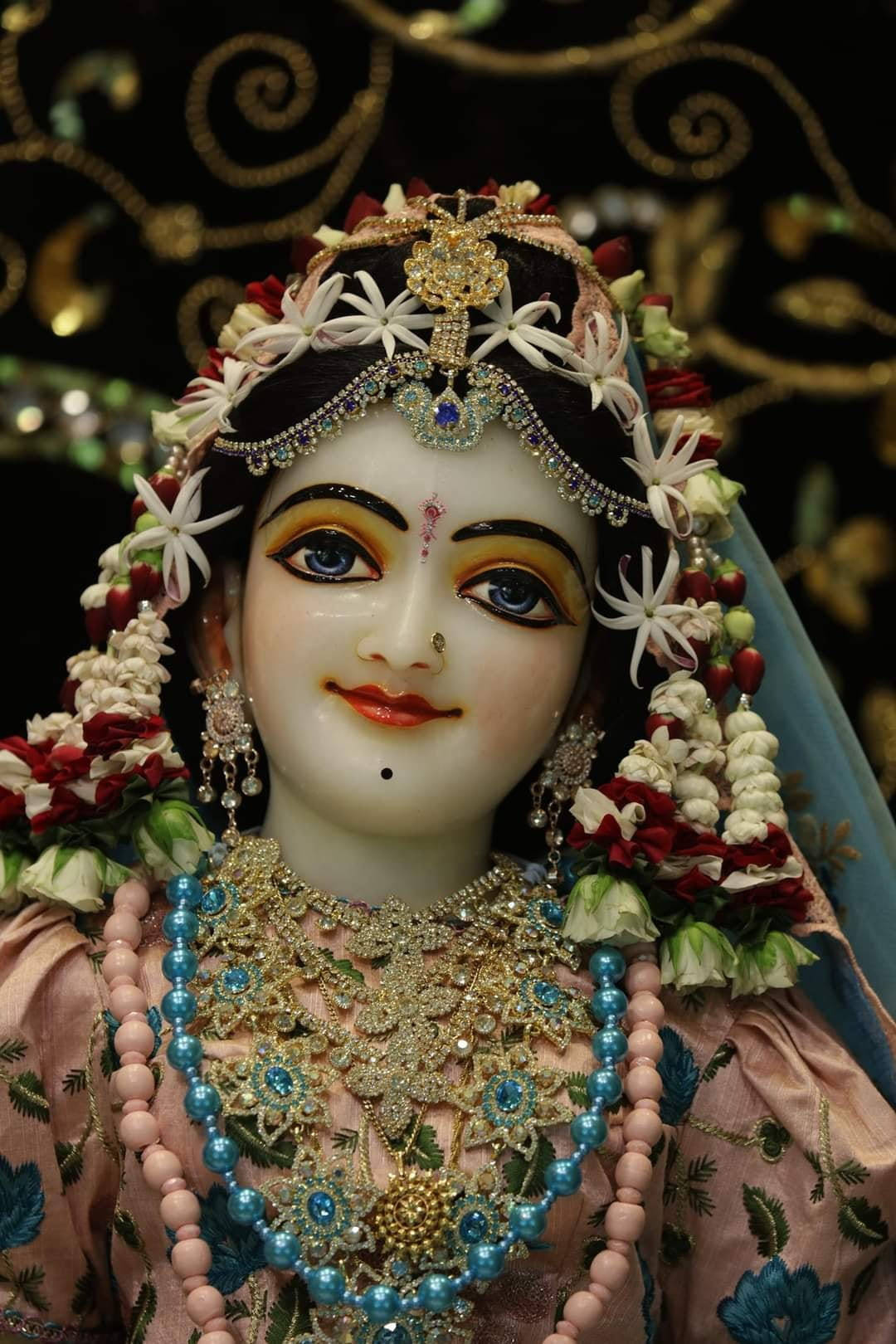 Beautiful Krishna Eternal Consort Statue Background