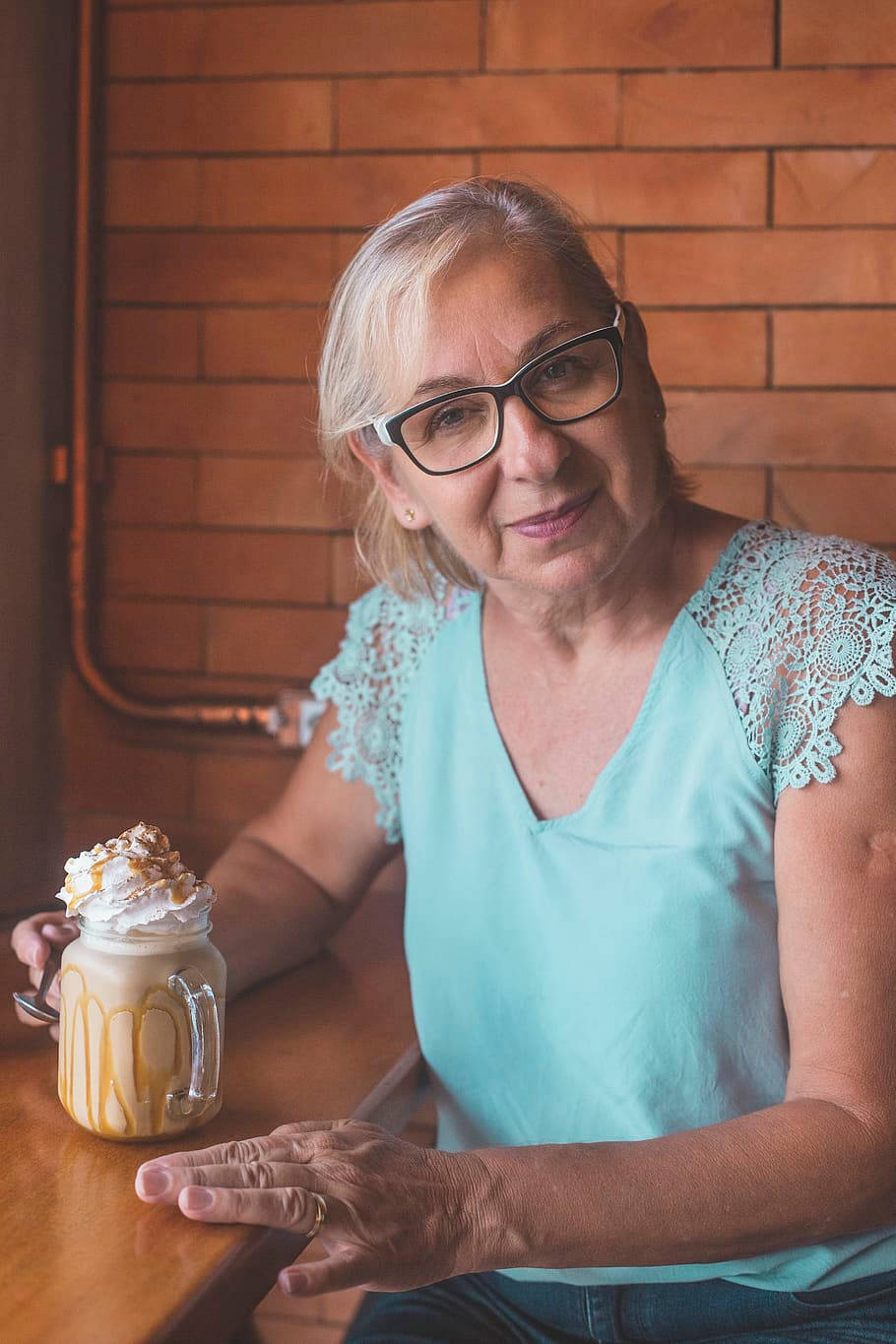 Beautiful Older Woman Drinking Milkshake Background