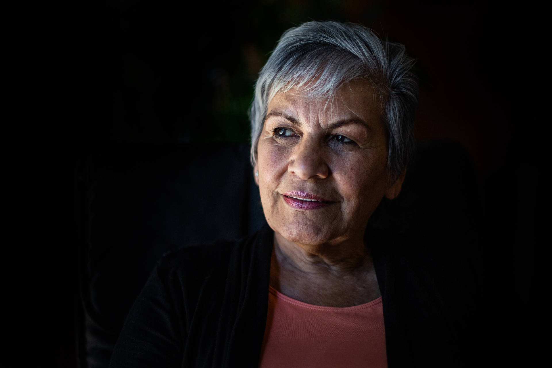 Beautiful Older Woman On Black Background