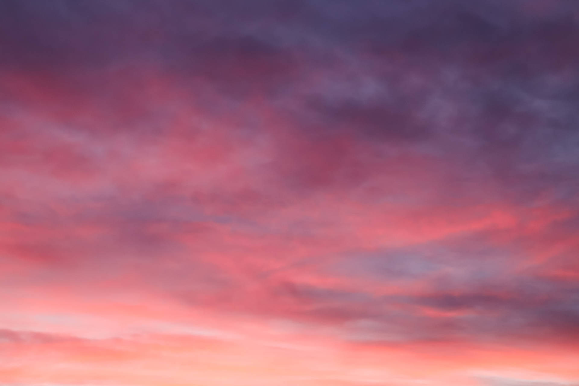 'beautiful Pink And Gray Ombre Clouds Against A Clear Sky' Background
