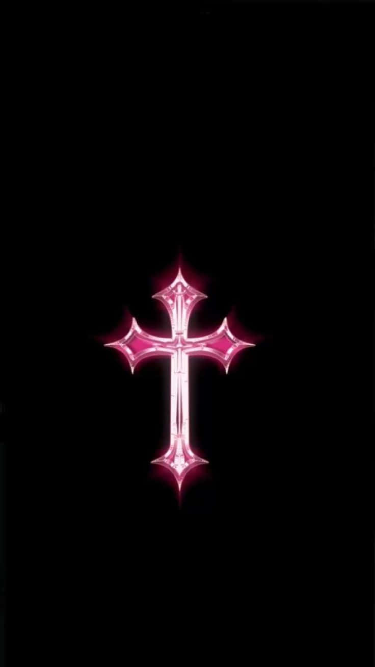 Beautiful Pink Cross Surrounded By A Tranquil Landscape Background