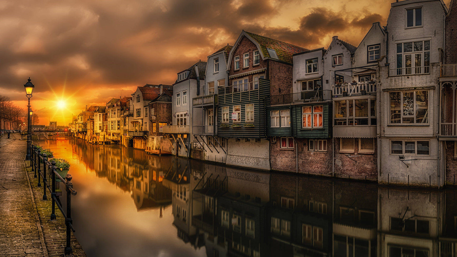 Beautiful Scenery Houses By The River Background