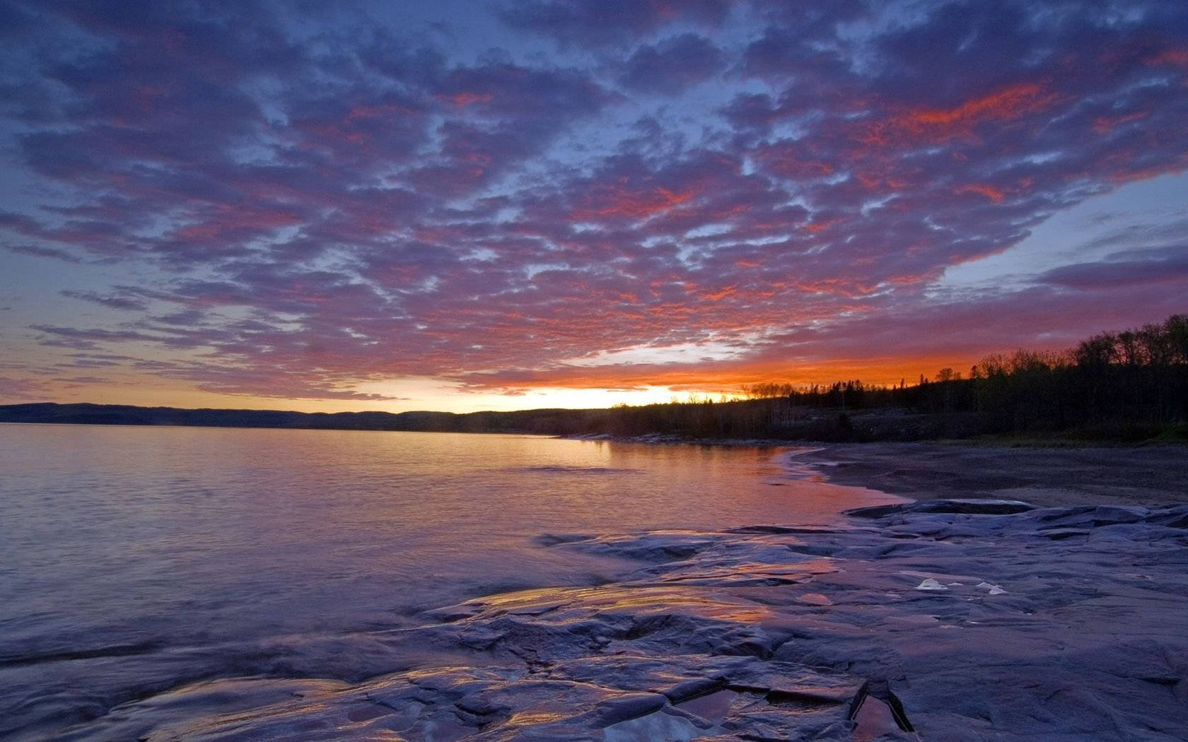 Beautiful Sunset At Lake Superior Background