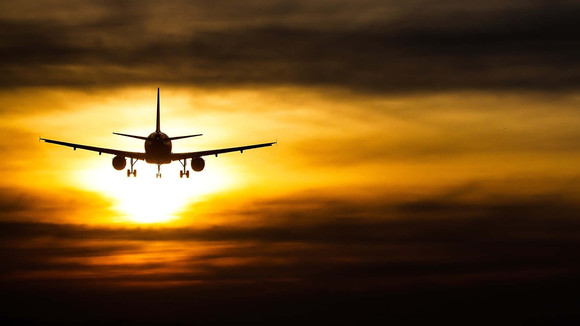 Beautiful Sunset Landing Plane Background Background