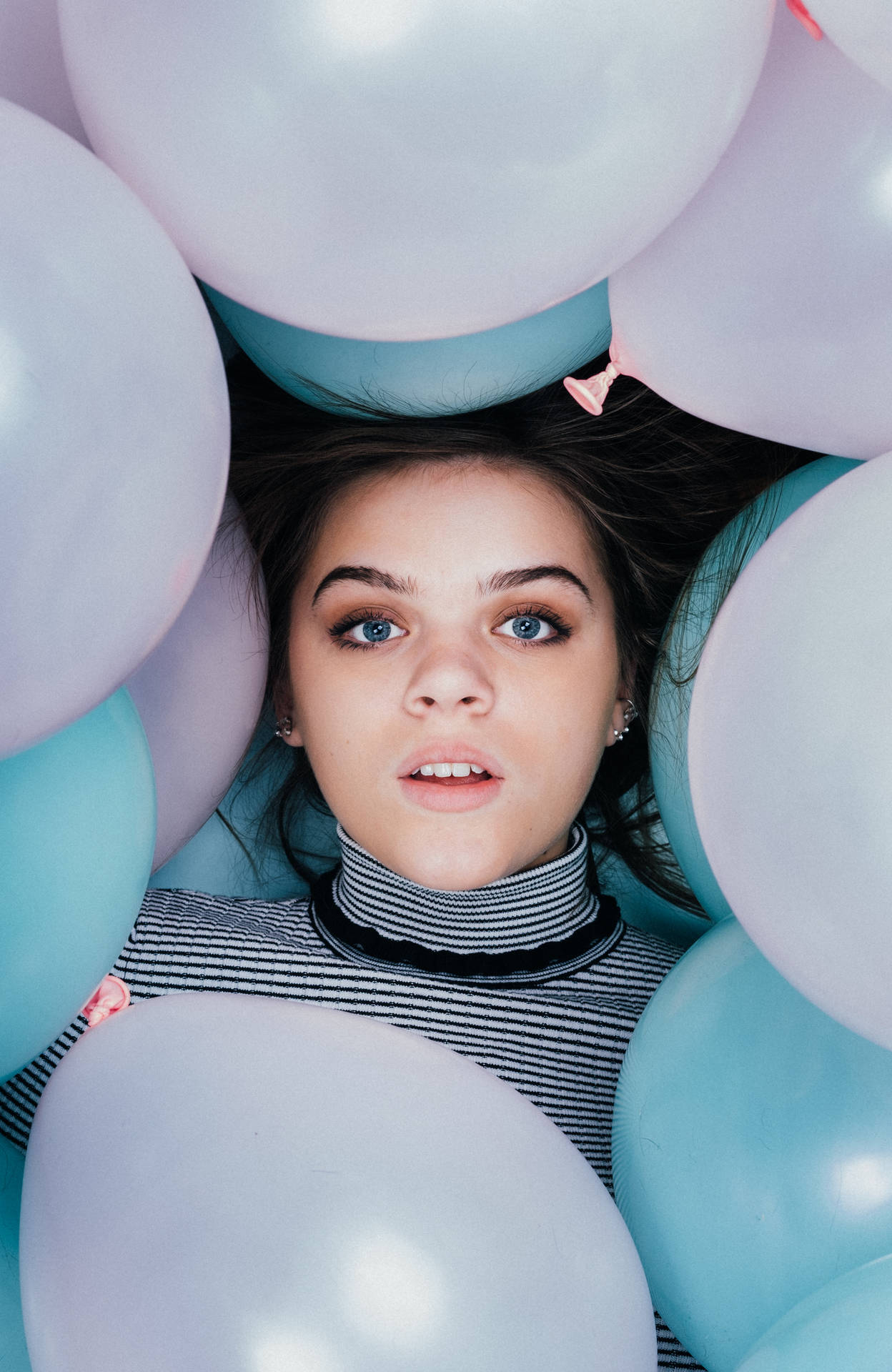 Beautiful Teenage Girl In Balloons Background
