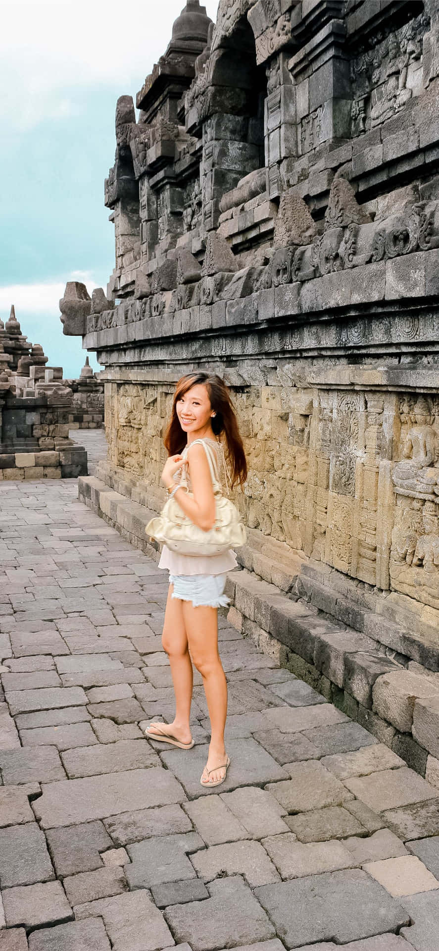 Beautiful Woman In Borobudur Temple Background