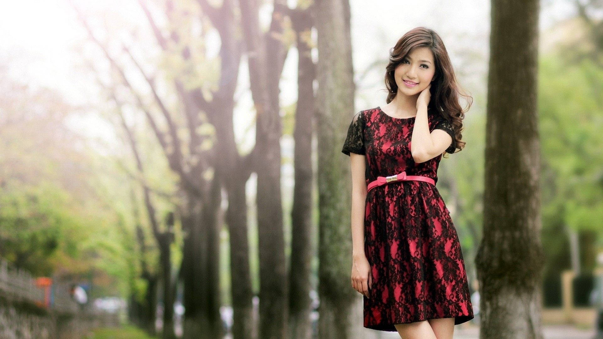 Beautiful Woman Posing At A Park