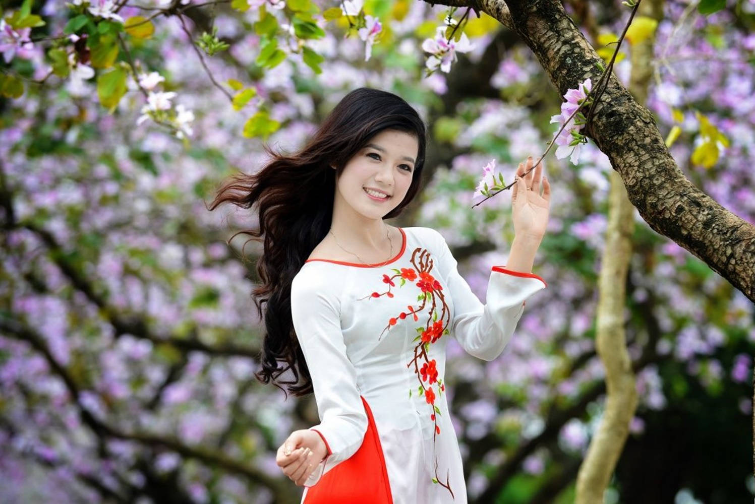 Beautiful Woman Posing With Pretty Trees