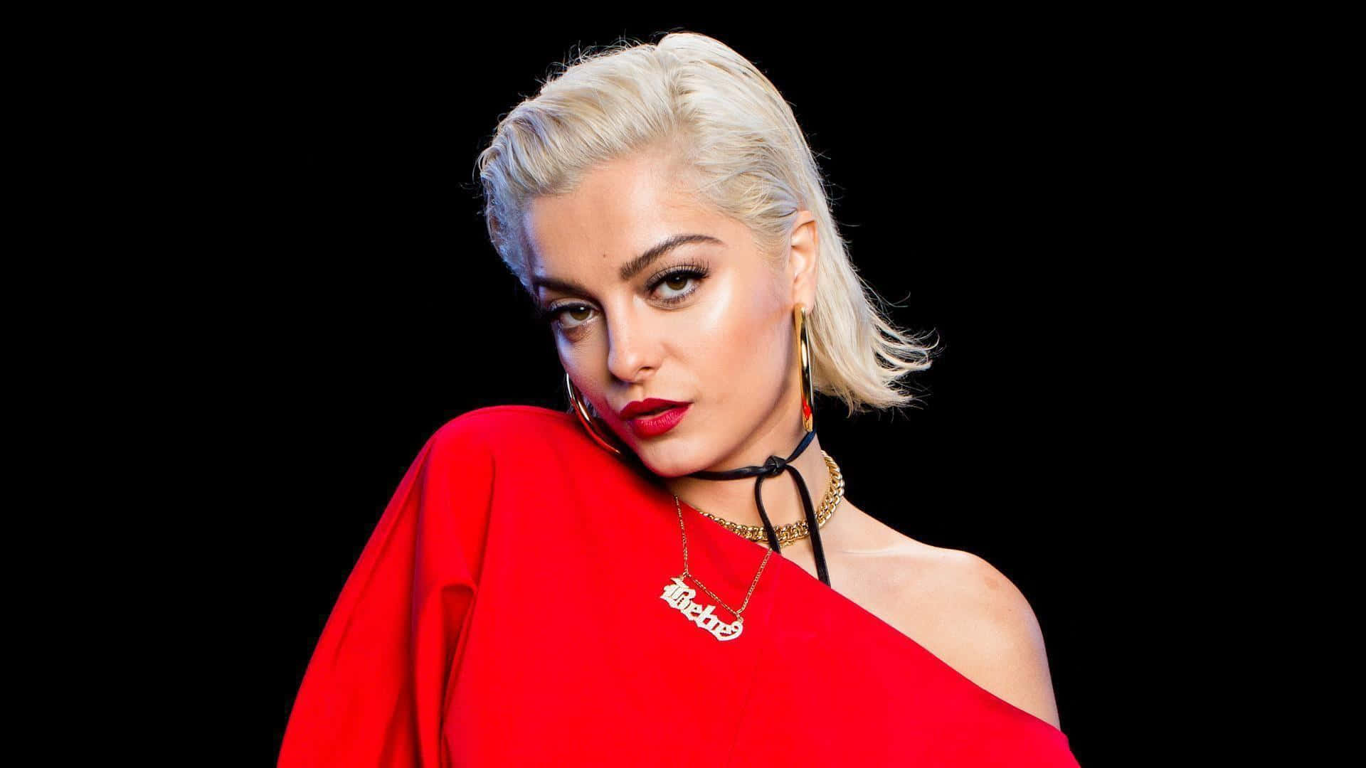 Bebe Rexha In Stunning Black Outfit During A Live Performance Background