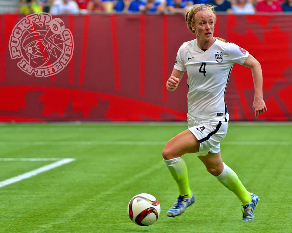 Becky Sauerbrunn Dominating In The Game Background