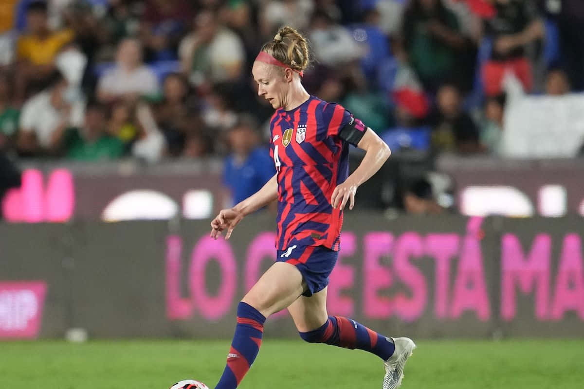 Becky Sauerbrunn, Dominating The Soccer Field Background