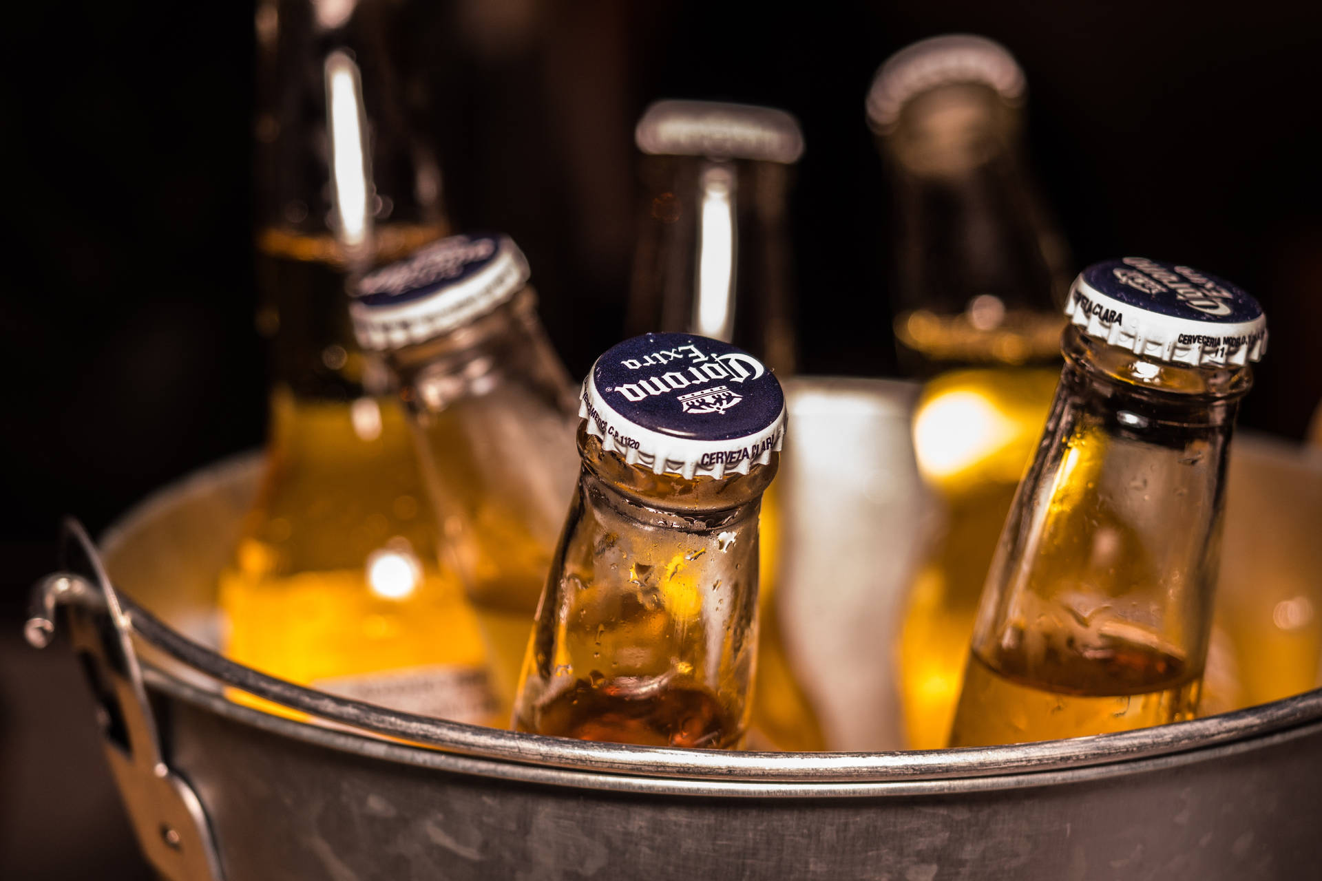 Beer Bottles Inside A Bucket Background