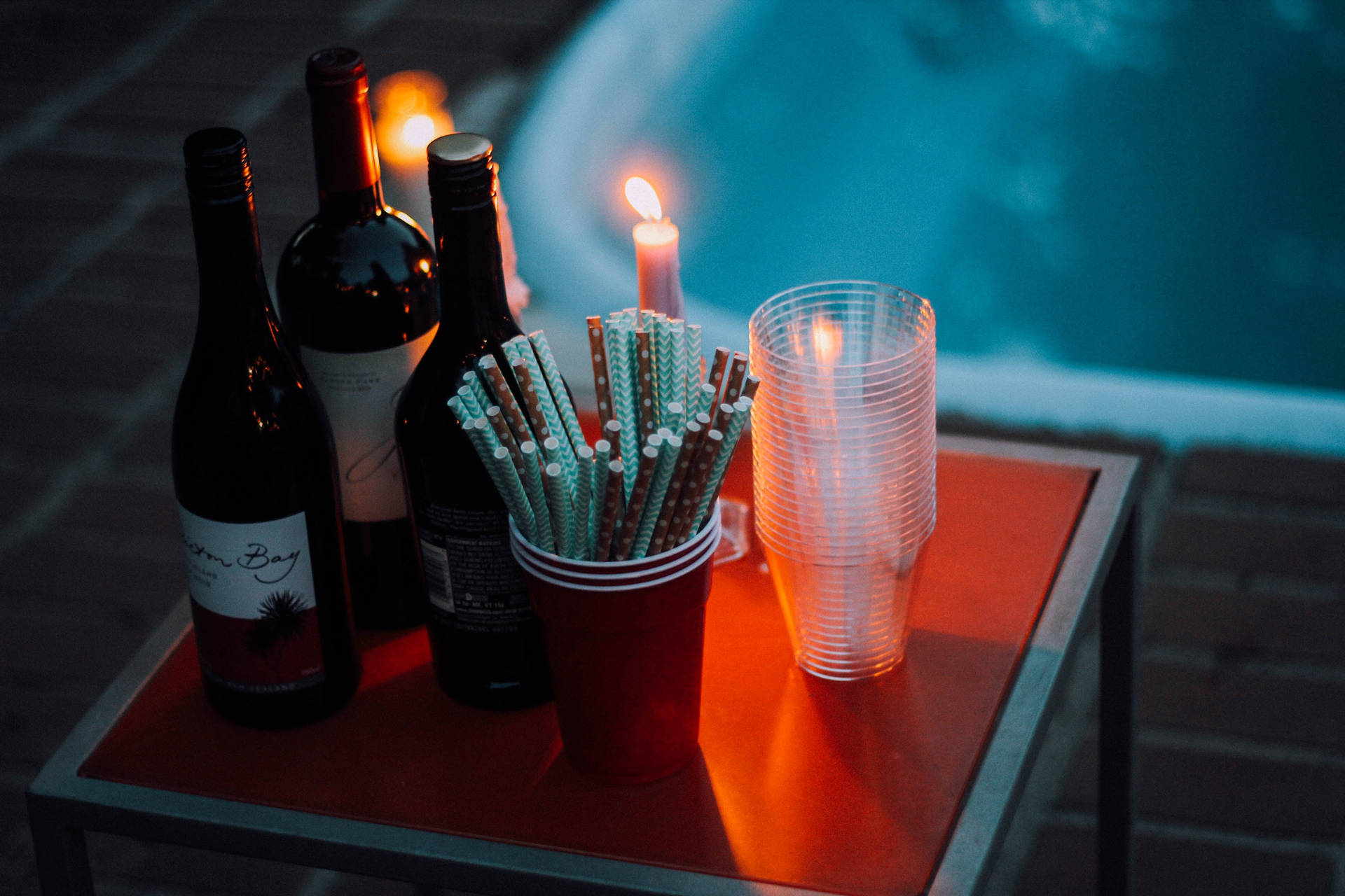 Beer Bottles On An Orange Table Background