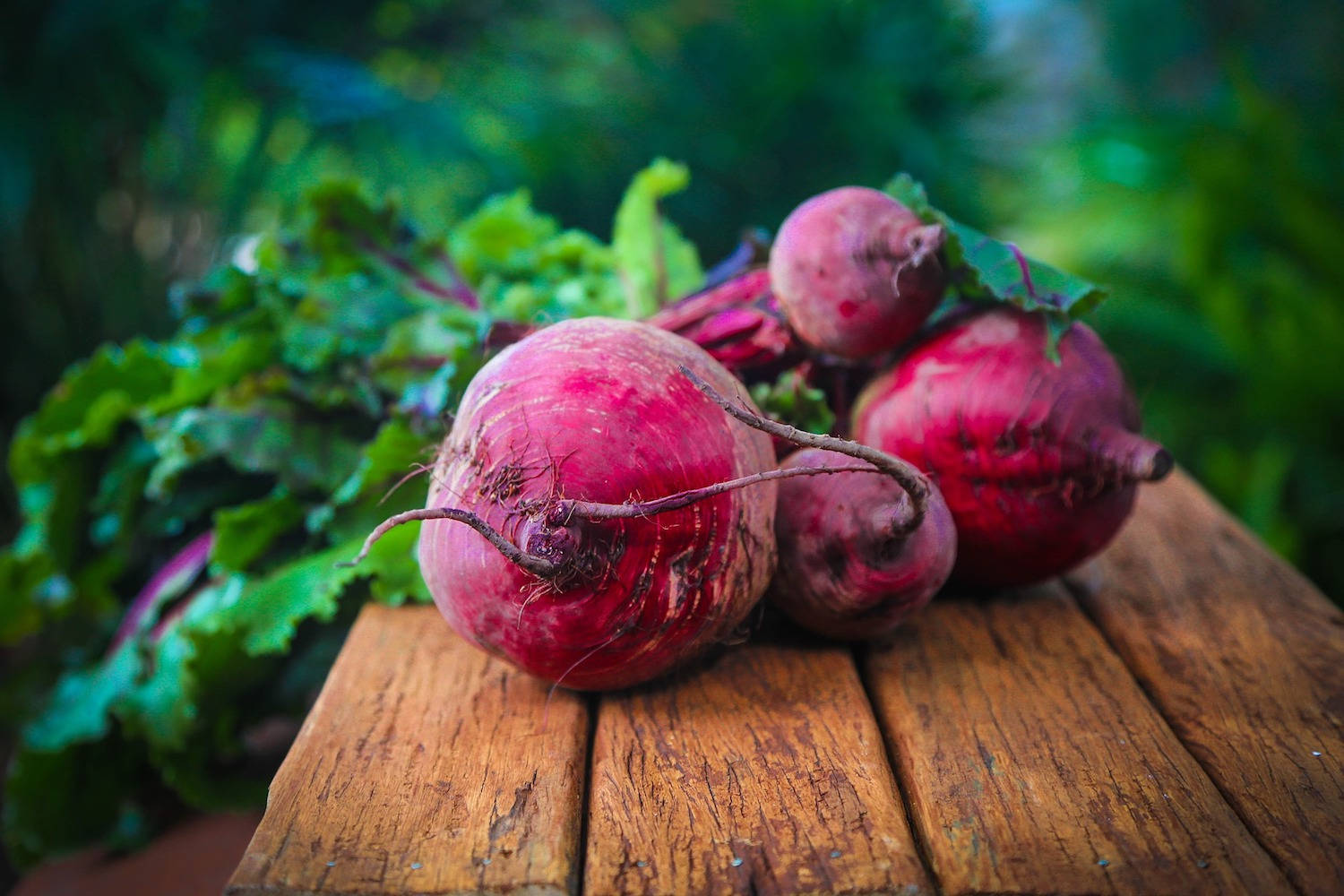 Beetroots On A Wooden Board Background