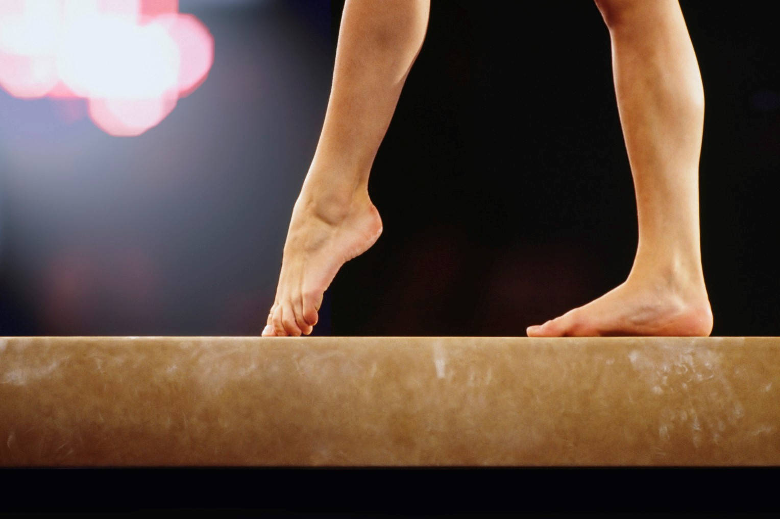 Beginner Gymnastics Exercise On Balance Beam