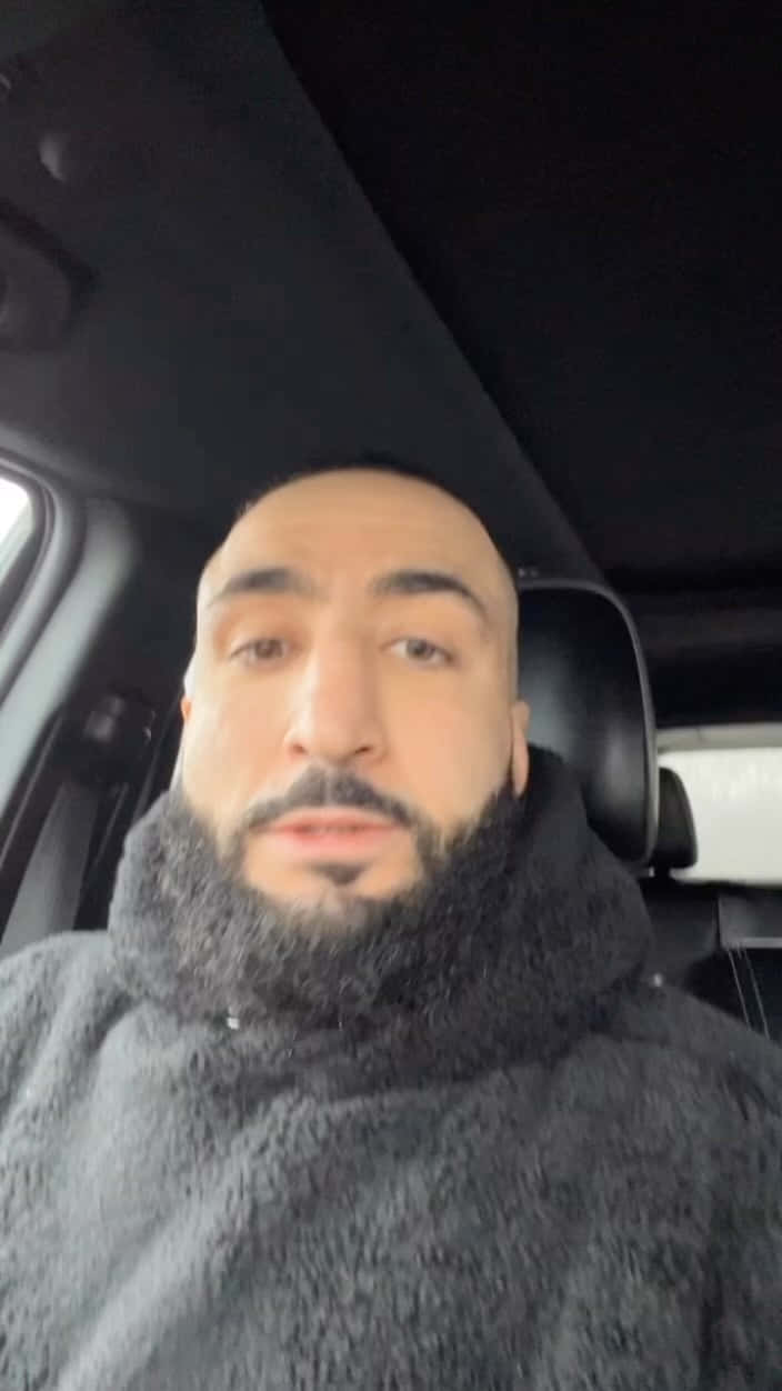 Belal Muhammad In The Car Background