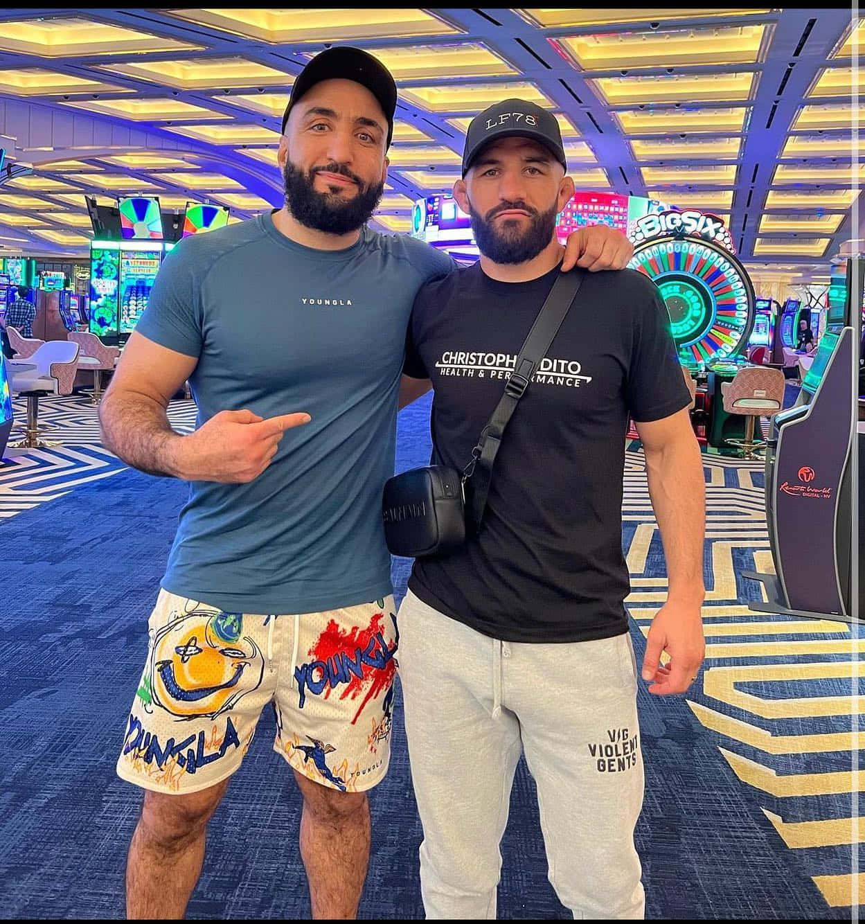 Belal Muhammad Posing With Friend Background