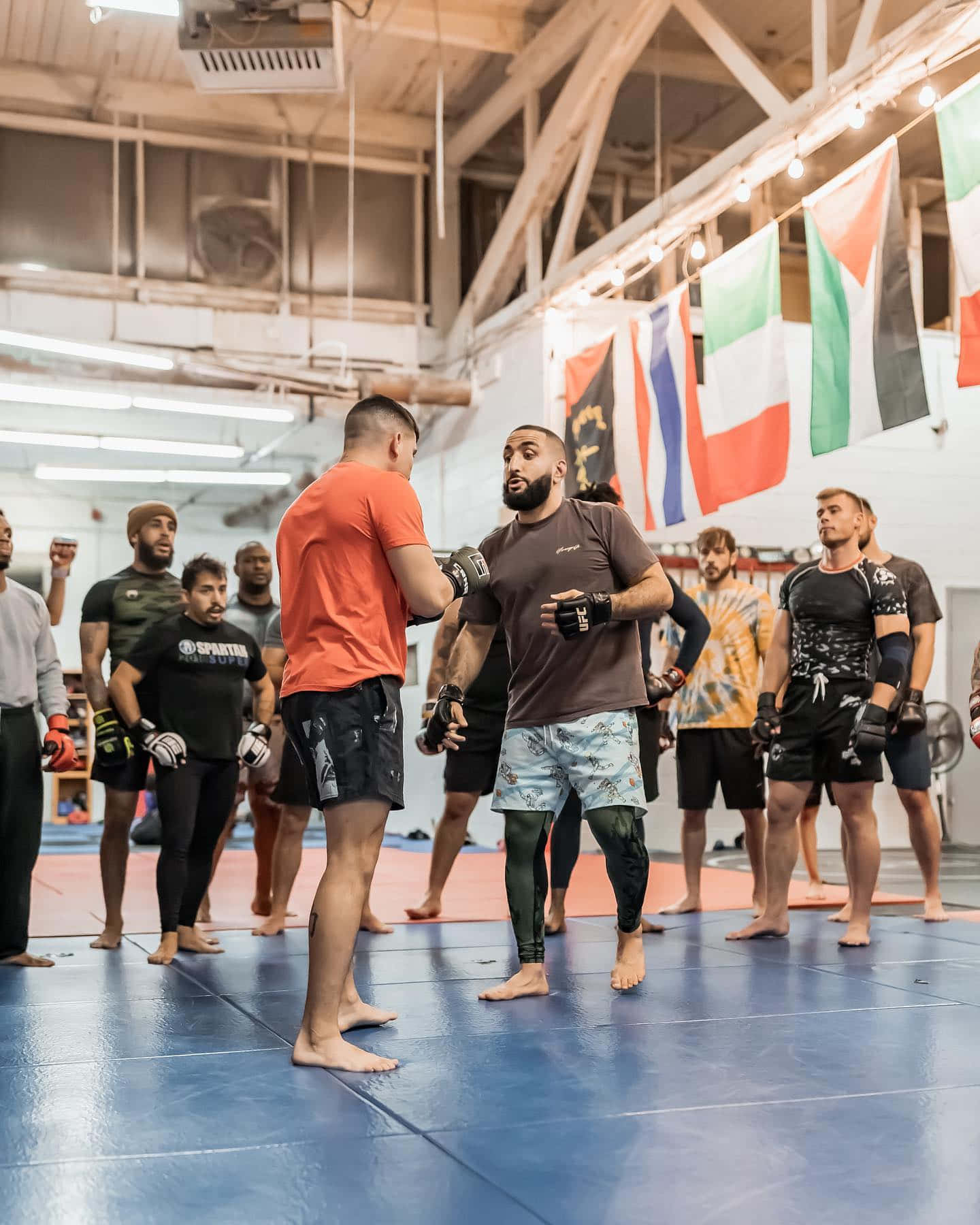 Belal Muhammad Ready To Spar In Gym Background