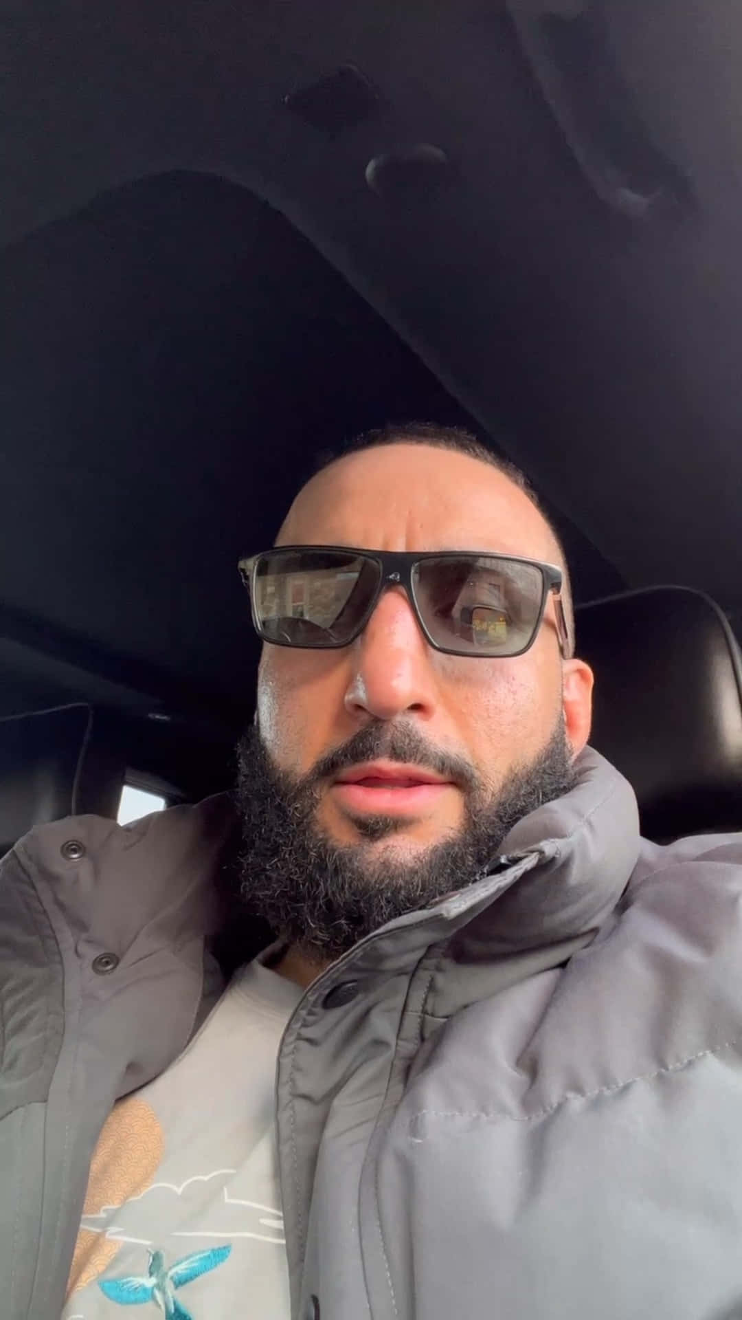 Belal Muhammad Wearing Sunglasses And Jacket Background