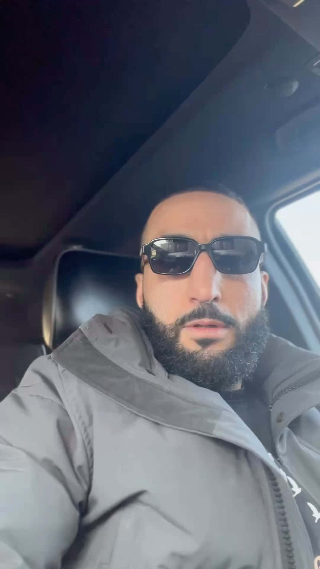 Belal Muhammad Wearing Sunglasses In The Car Background