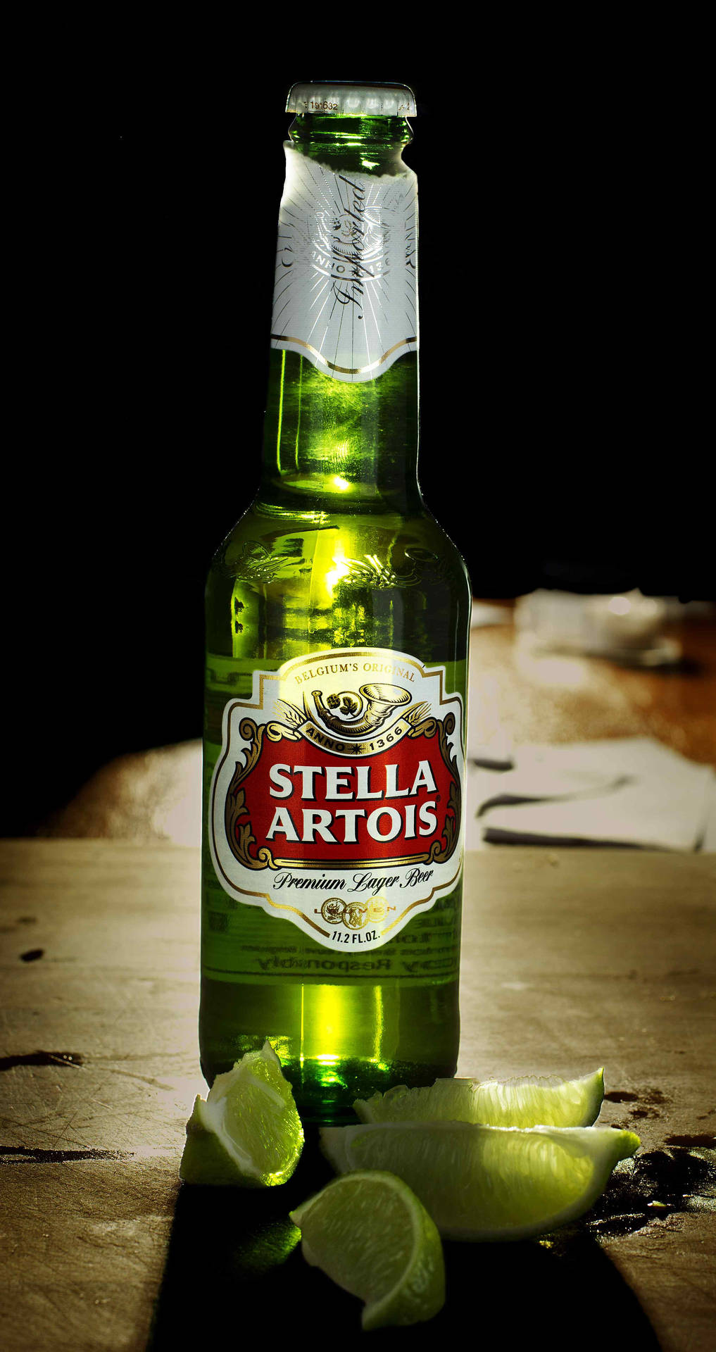 Belgian Beer Stella Artois With Lime Background