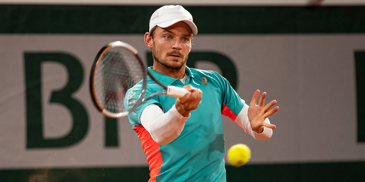 Belgian Tennis Pro David Goffin In Action Background