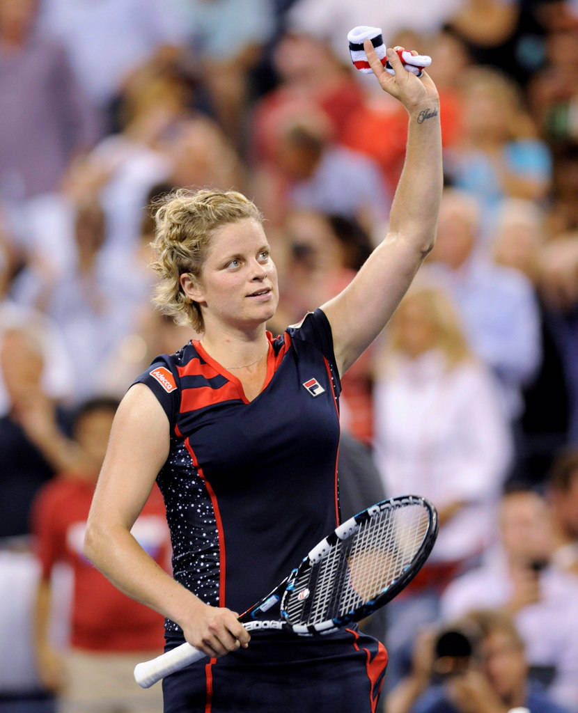 Belgian Tennis Prodigy Kim Clijsters In Action Background