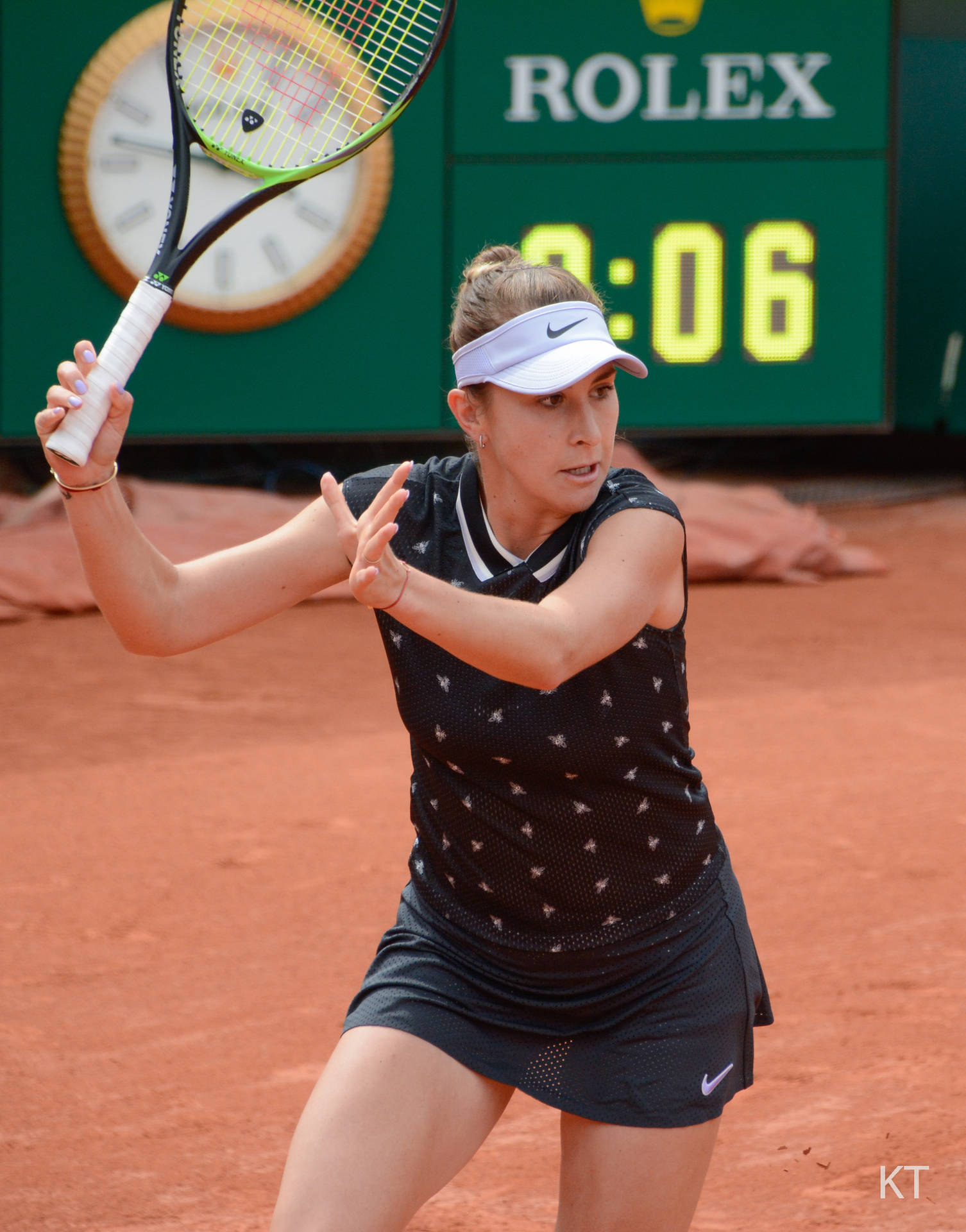 Belinda Bencic Exhibiting Strength In Black Outfit Background