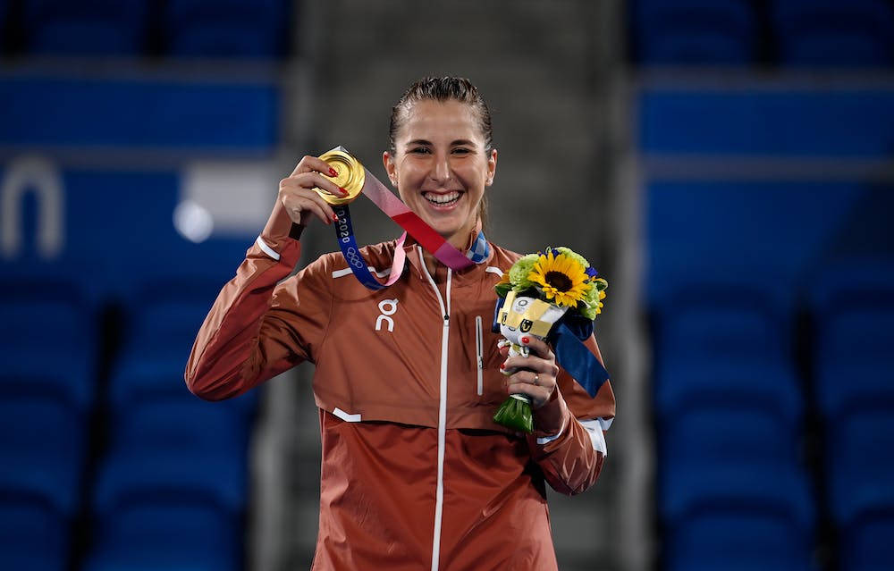 Belinda Bencic Glowing With Gold Medal Achievement Background