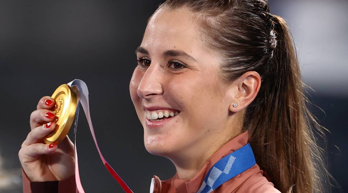 Belinda Bencic Holding Medal Background