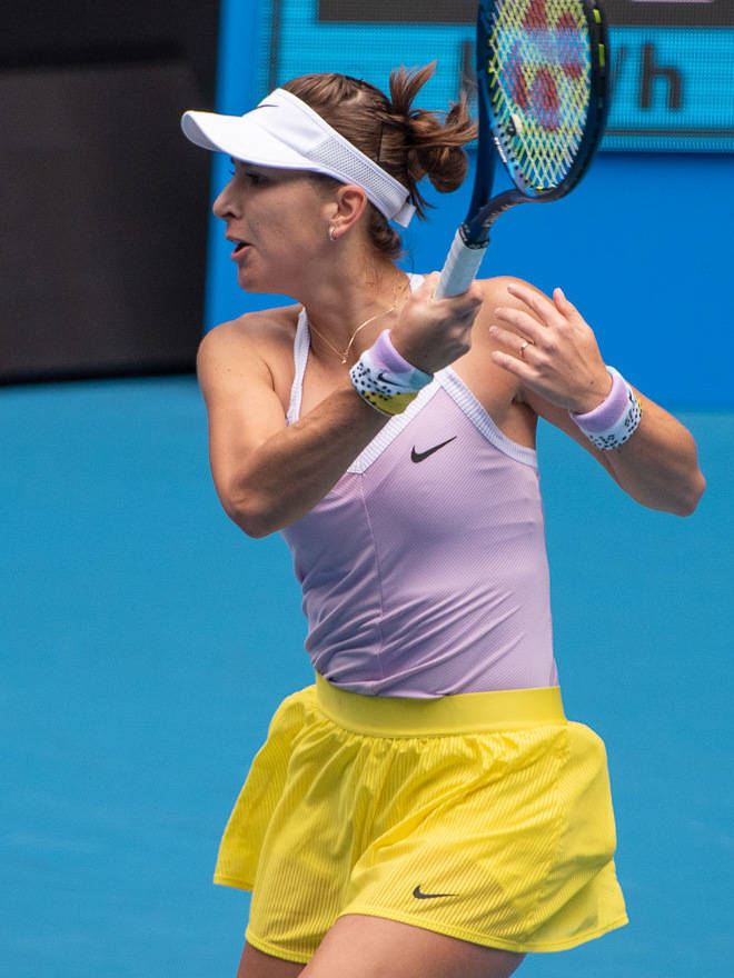 Belinda Bencic In Colorful Outfit Background