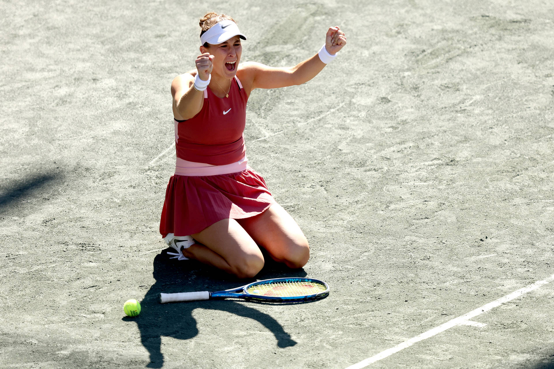 Belinda Bencic Kneeling On Court Background