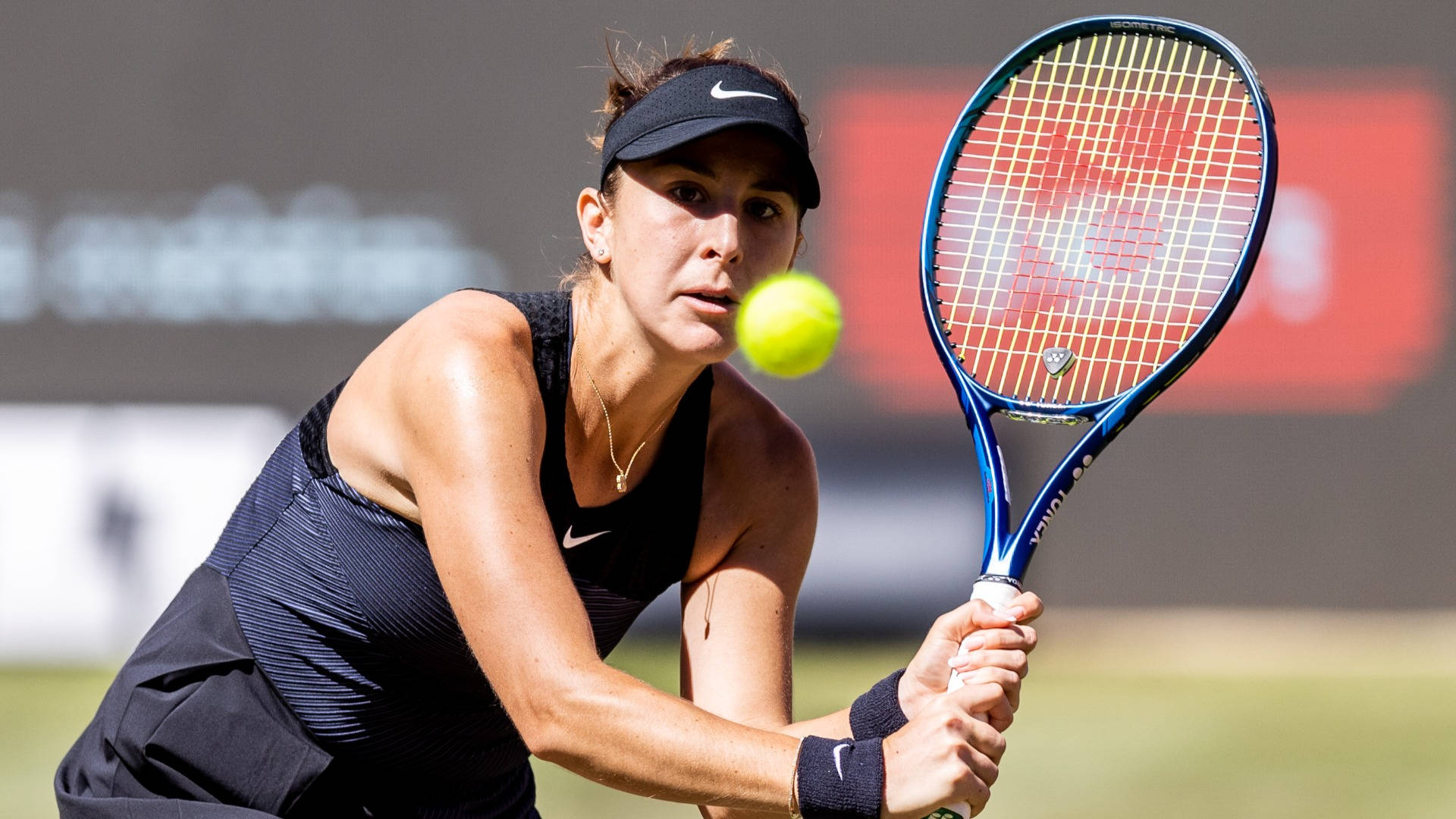 Belinda Bencic Receiving Tennis Ball Background