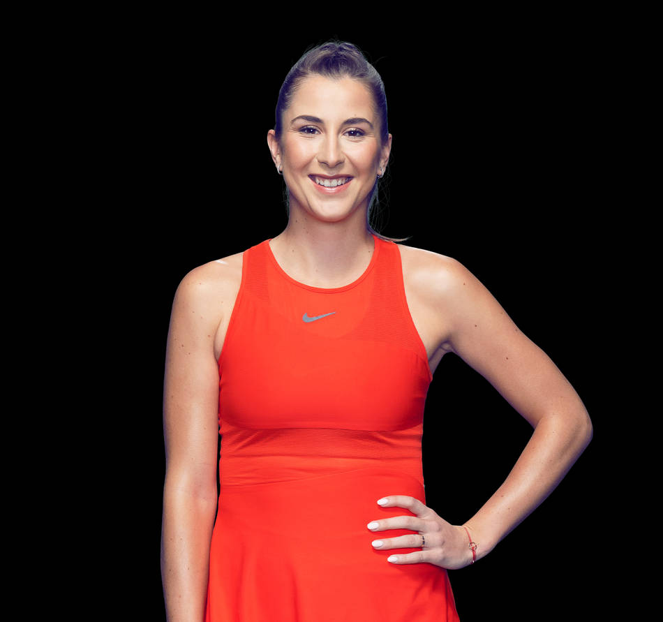 Belinda Bencic Wearing Bright Red Outfit Background