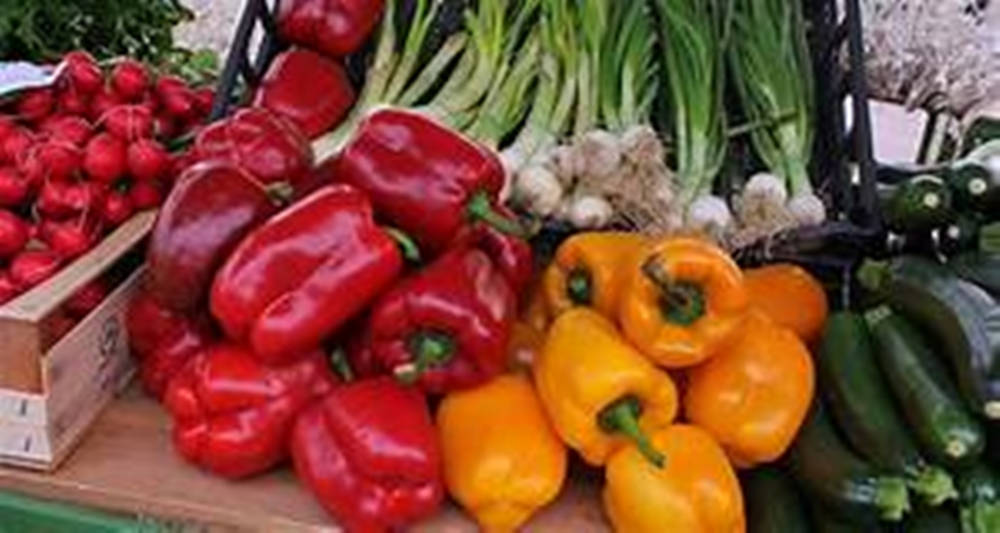 Bell Pepper Fruits Alongside Other Vegetables Background