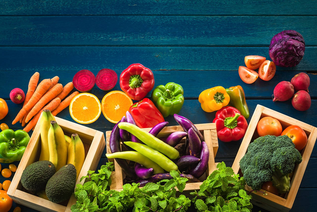 Bell Pepper Fruits On Blue Wooden Platform Background