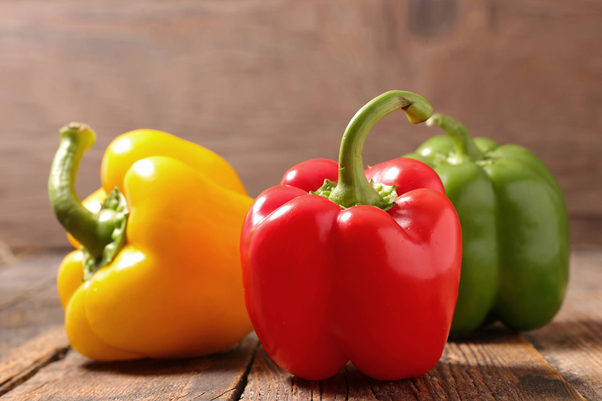 Bell Pepper Fruits On Wooden Platform