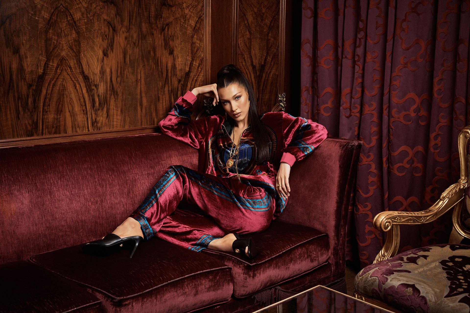 Bella Hadid Sitting Velvet Couch Background