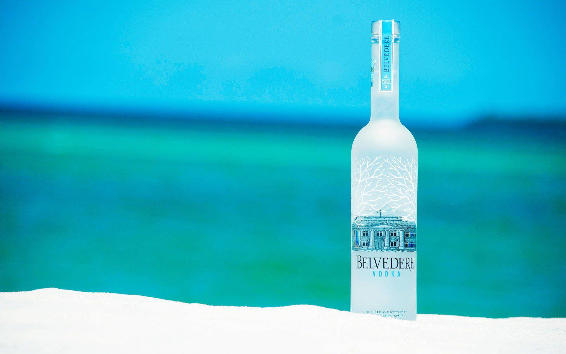 Belvedere Vodka On The Beach Background