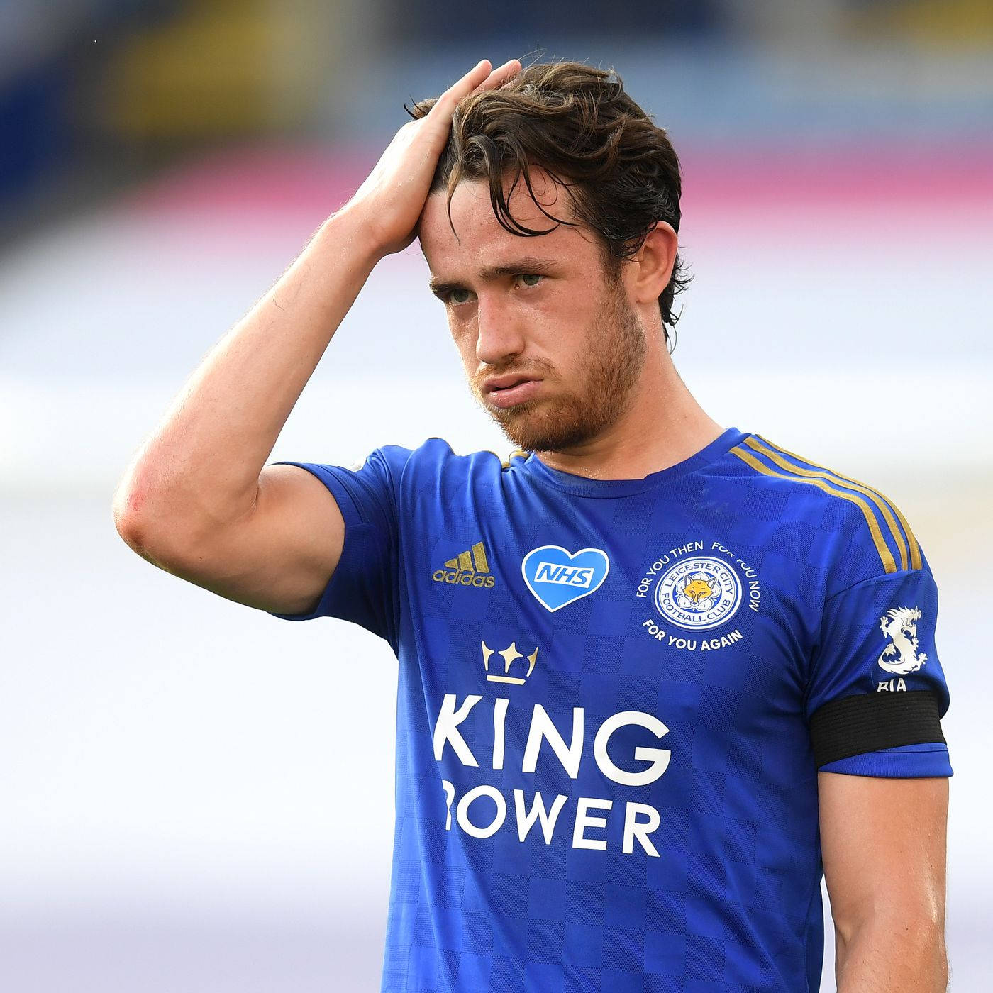 Ben Chilwell Brushing Hand In Hair Background