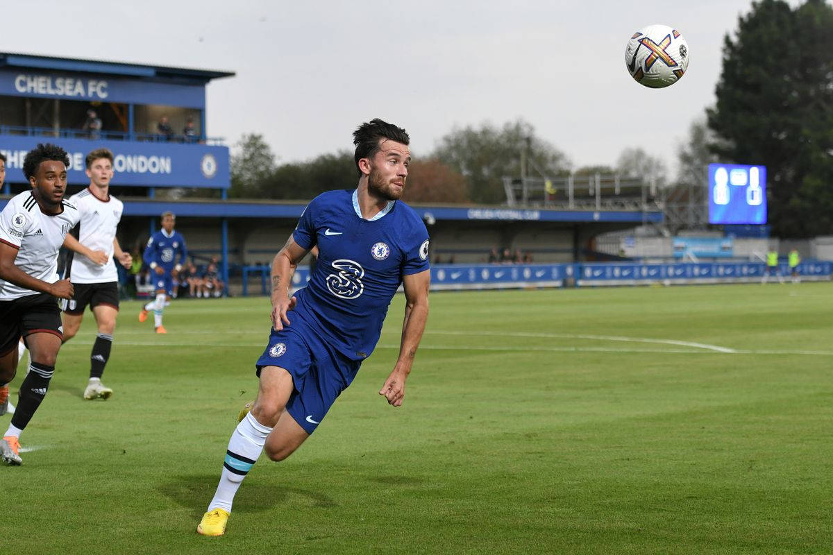 Ben Chilwell Running After A Ball Background